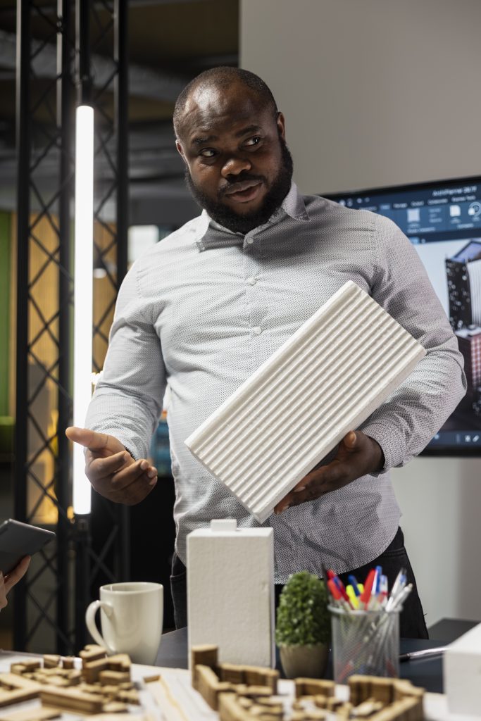 black property engineer presenting construction details on 3d models